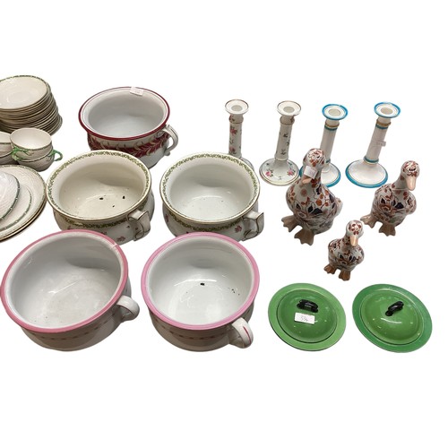 219 - A quantity of china to include Chamber Pots, Candle Sticks, Imari Palette ducks, a pair of Soho Pott... 