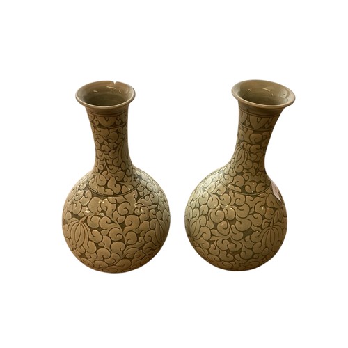 223 - A pair of decorative, Chinese Celadon style bottle neck vases  29cm High, chip to rim