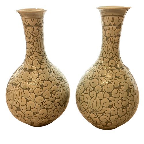 223 - A pair of decorative, Chinese Celadon style bottle neck vases  29cm High, chip to rim