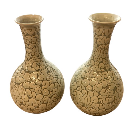 223 - A pair of decorative, Chinese Celadon style bottle neck vases  29cm High, chip to rim