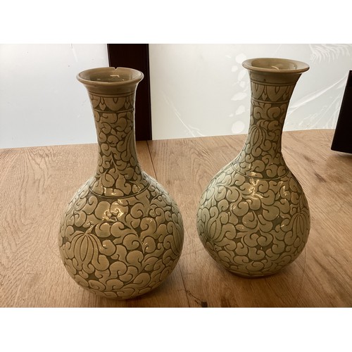 223 - A pair of decorative, Chinese Celadon style bottle neck vases  29cm High, chip to rim