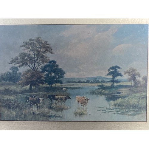 437 - Walter Norfolk(XIX-XX) Watercolour on paper of cattle watering. In a gilt glazed frame. Signed lower... 