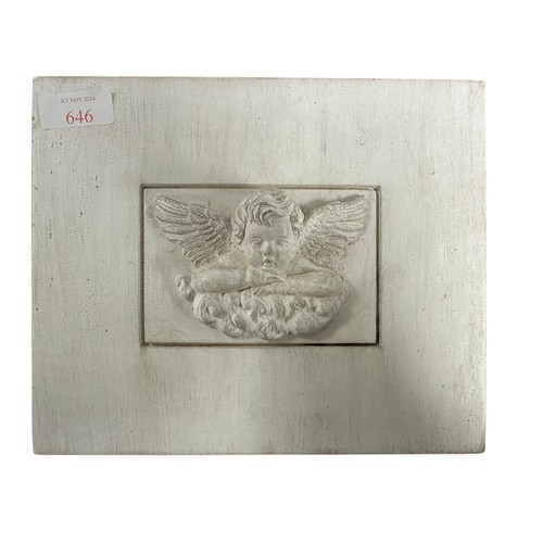 238 - A square stone tile with plaster inset of  winged cherub on a cloud, 18 x 23