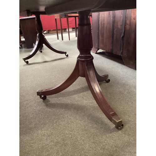 534 - A Georgian  mahogany twin pedestal D end dining table with central leaf, 257cm overall approx. In ne... 