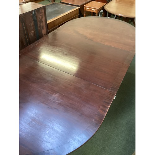 534 - A Georgian  mahogany twin pedestal D end dining table with central leaf, 257cm overall approx. In ne... 