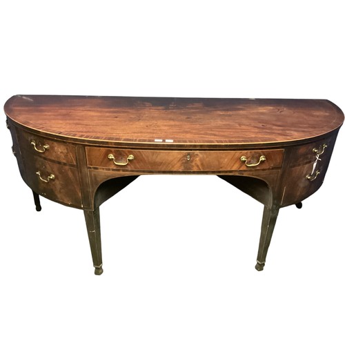 538 - A large Georgian mahogany and inlaid  demi lune sideboard, the large central drawer flanked by dummy... 