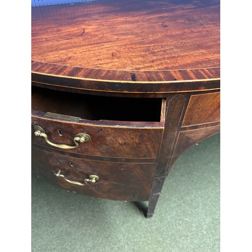 538 - A large Georgian mahogany and inlaid  demi lune sideboard, the large central drawer flanked by dummy... 