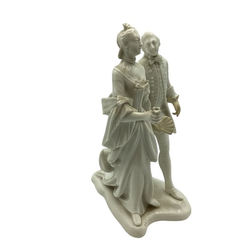 242 - A Nymphenburg, Dresden white porcelain figure group of a man and woman in 19th century dress. Some r... 