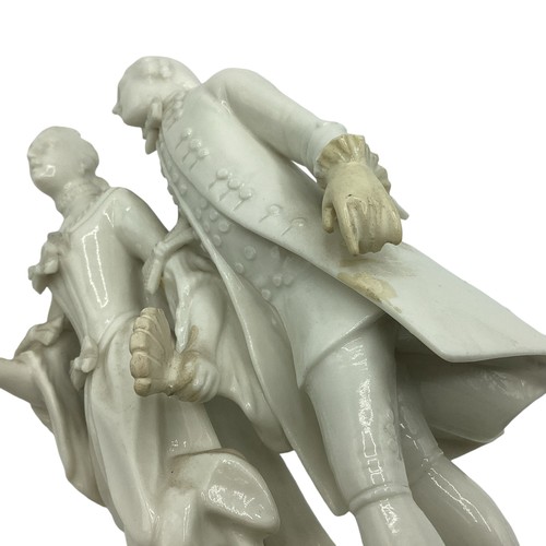 242 - A Nymphenburg, Dresden white porcelain figure group of a man and woman in 19th century dress. Some r... 