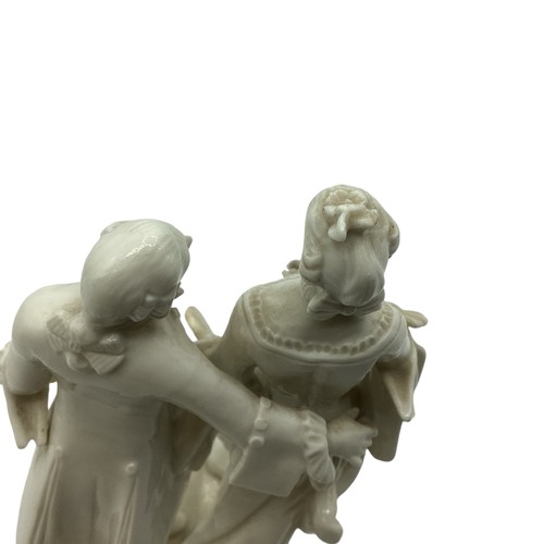 242 - A Nymphenburg, Dresden white porcelain figure group of a man and woman in 19th century dress. Some r... 