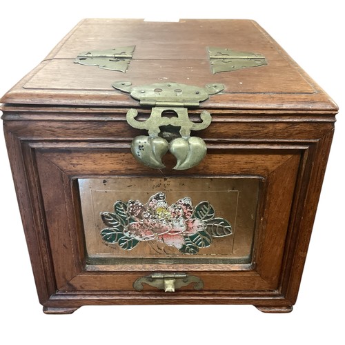 201 - A collection of Oriental items to include a travel dressing box , a nine section Famille Rose servin... 