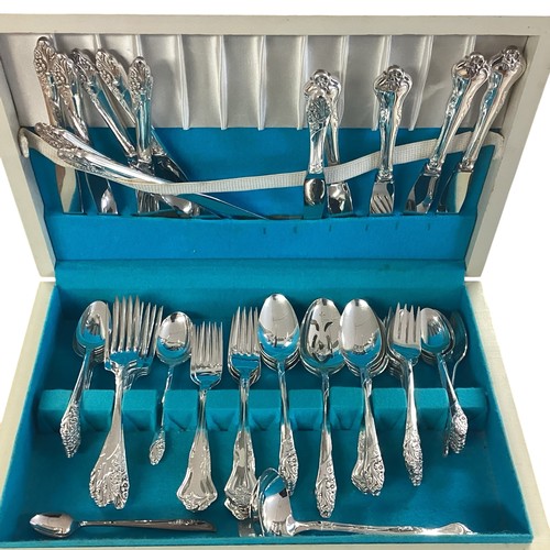 18 - A silver plated boxed canteen of cutlery together with other boxed cutlery sets , two small hip flas... 