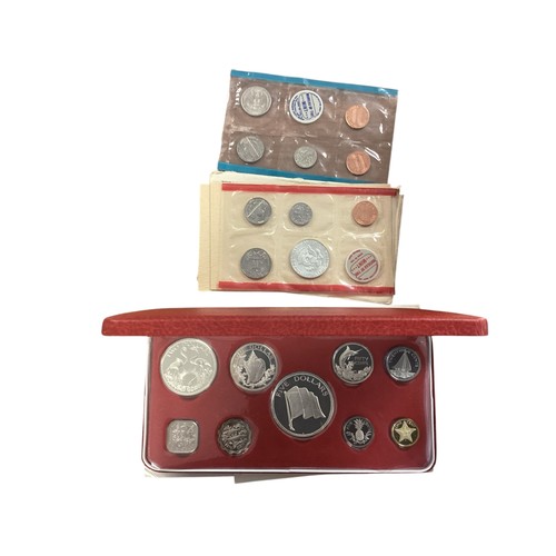 15 - A large collection of boxed Franklin Mint commemorative World coinage to include Cayman Island , Sie... 