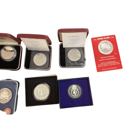 15 - A large collection of boxed Franklin Mint commemorative World coinage to include Cayman Island , Sie... 