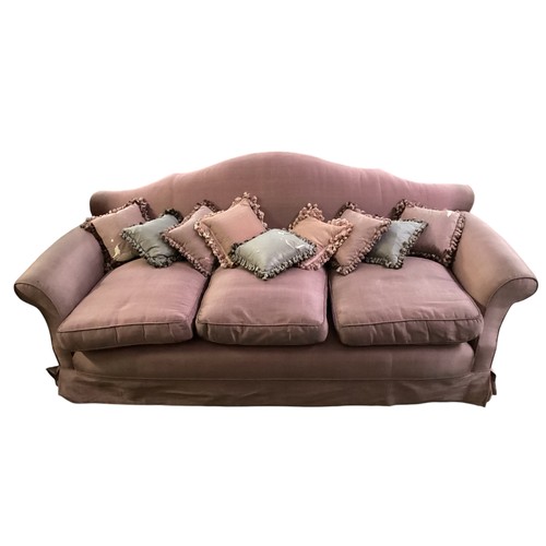 506 - Three seater pink upholstered sofa 209cm wide x 104cm depth x 85cm high, loose wheel, some marks and... 