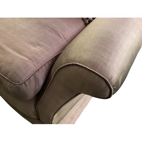 506 - Three seater pink upholstered sofa 209cm wide x 104cm depth x 85cm high, loose wheel, some marks and... 