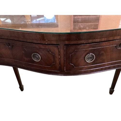 513 - A Pair of C19th serpentine fronted mahogany side tables, glass tops,  115cm wide x 55cm deep x 88cm ... 