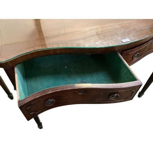 513 - A Pair of C19th serpentine fronted mahogany side tables, glass tops,  115cm wide x 55cm deep x 88cm ... 