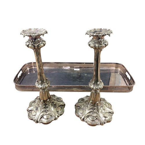 38 - A pair of antique large silver plated candlesticks together with a silver plated galleried tray. Sti... 