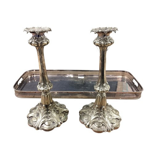 38 - A pair of antique large silver plated candlesticks together with a silver plated galleried tray. Sti... 