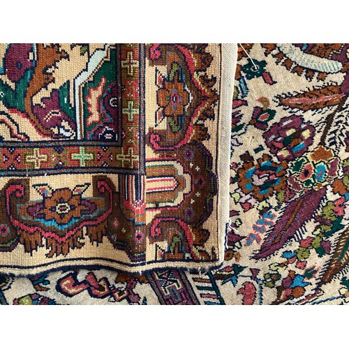 360 - Persian rug, central pattern of flower vases and weeping women and ornate borders with birds. Colour... 