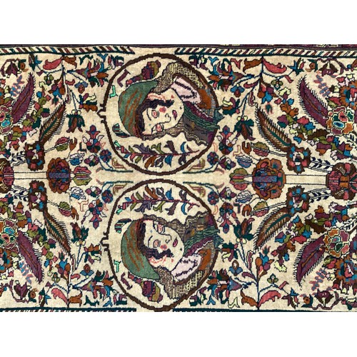 360 - Persian rug, central pattern of flower vases and weeping women and ornate borders with birds. Colour... 