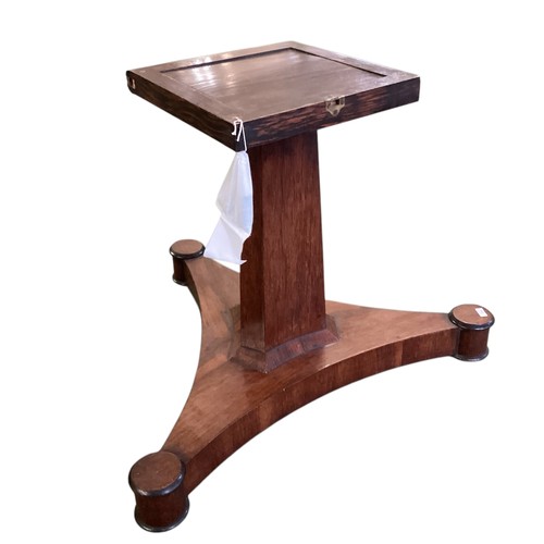 556 - Circular MDF table top fitted for a period mahogany tripod pedestal base with caster wheels , diamet... 