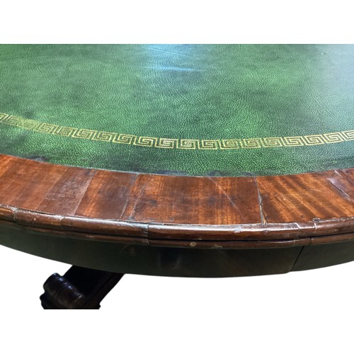 557 - A mahogany C19th Drum table.  circa 1840, with green leather top, 6 numbered drawers , caster wheels... 