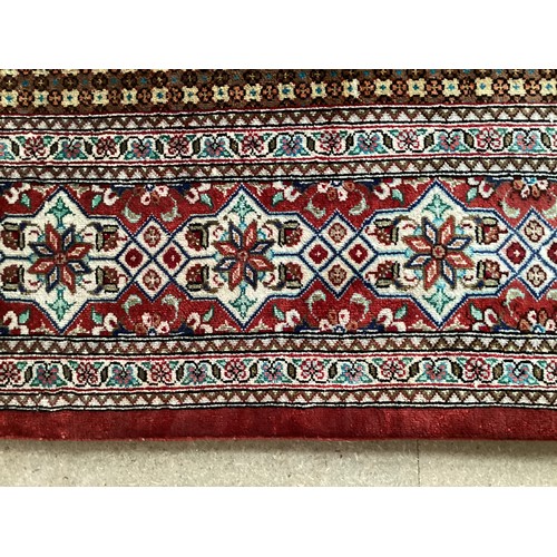 353 - Oriental handmade silk rug/prayer mat, central pattern a vase with flowers in temple with geometric ... 