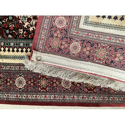 354 - Oriental handmade silk rug/prayer mat, central pattern with ornate border. Colours are mainly red, g... 