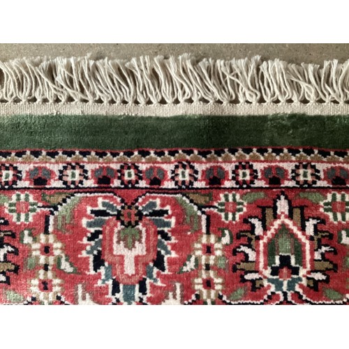 355 - Oriental handmade silk rug with central medallion and pattern borders. Overall colours green, cream ... 