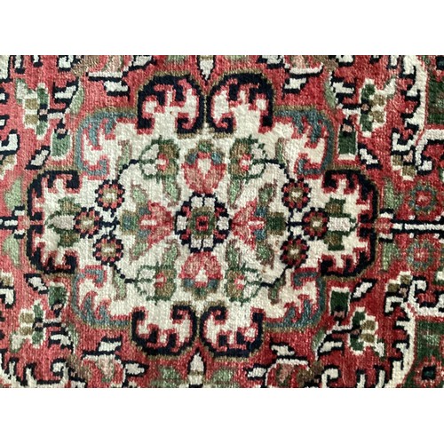 355 - Oriental handmade silk rug with central medallion and pattern borders. Overall colours green, cream ... 