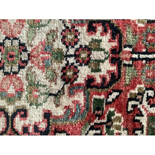 355 - Oriental handmade silk rug with central medallion and pattern borders. Overall colours green, cream ... 