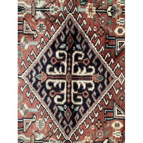 356 - Kashmir silk rug with central three diamond and birds pattern and blue pattern border. Main  colours... 