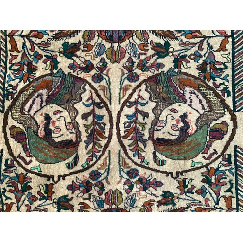 360 - Persian rug, central pattern of flower vases and weeping women and ornate borders with birds. Colour... 