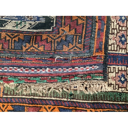 362 - Afghan handmade rug , central pattern depicting a temple and a rug with a border. Colours are cream ... 