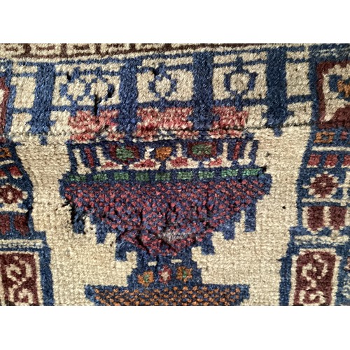 362 - Afghan handmade rug , central pattern depicting a temple and a rug with a border. Colours are cream ... 