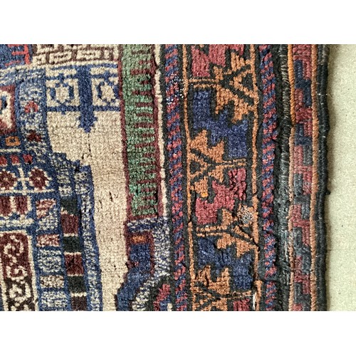 362 - Afghan handmade rug , central pattern depicting a temple and a rug with a border. Colours are cream ... 