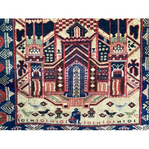 364 - Oriental wool handmade rug with central pattern depicting a temple with birds and people and a borde... 