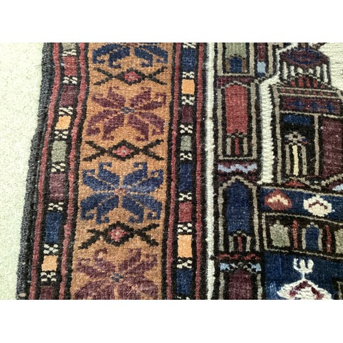 365 - Wool handmade rug, depicting temples and border. Main colours are brown, cream blues, 80-82cm x 131.... 