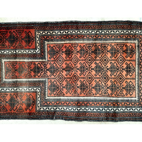 369 - Wool handmade rug with central pattern and border. Main colours are orange and brown. Condition- few... 