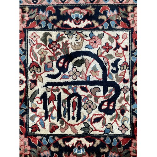 371 - Two similar small wool ? handmade oriental rugs , with central pattern of hieroglyphics symbols and ... 