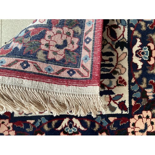 371 - Two similar small wool ? handmade oriental rugs , with central pattern of hieroglyphics symbols and ... 