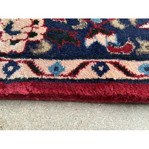 371 - Two similar small wool ? handmade oriental rugs , with central pattern of hieroglyphics symbols and ... 