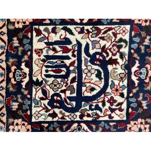 371 - Two similar small wool ? handmade oriental rugs , with central pattern of hieroglyphics symbols and ... 