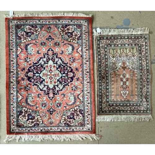 372 - Two small silk rugs/ prayer mats. Smaller one is Turkish cashar prayer rug with central pattern depi... 