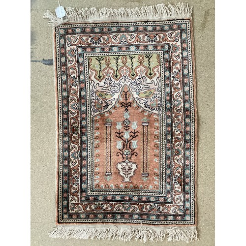 372 - Two small silk rugs/ prayer mats. Smaller one is Turkish cashar prayer rug with central pattern depi... 