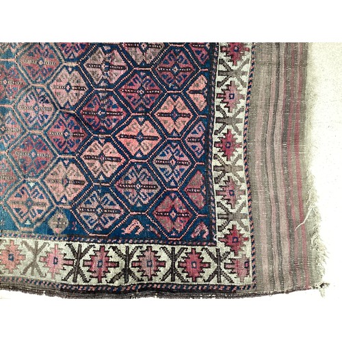 377 - Three small rugs, see photos for details, much wear to edges and all over wear commensurate with use... 