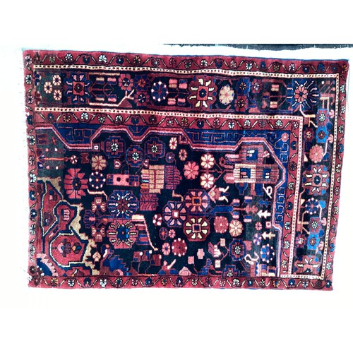 377 - Three small rugs, see photos for details, much wear to edges and all over wear commensurate with use... 