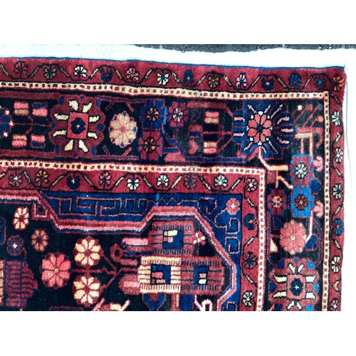 377 - Three small rugs, see photos for details, much wear to edges and all over wear commensurate with use... 